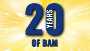 BAM Agency A radiant yellow background with white starbursts highlights bold blue text reading 20 YEARS OF BAM, celebrating the legacy of BAM Agency, Est. 1998. BAM Agency