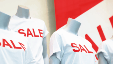 BAM Agency Mannequins clad in white t-shirts emblazoned with SALE in bold red letters take center stage, perfect for budget marketing. The backdrop features a striking red and white sale sign designed to capture the attention of savvy student shoppers. BAM Agency