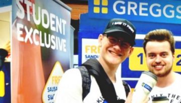 BAM Agency Two people are smiling in front of a Greggs promotion booth with Lucky Locker signage, capturing the essence of experiential marketing. Theyre holding drinks and wearing backpacks as they engage with the youth market. A third person is partially visible, facing a Student Exclusive banner. BAM Agency