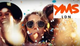BAM Agency A group of people celebrating, wearing hats and sunglasses, with colorful confetti in the air. The image promotes YMS LDN, Europes largest festival of youth marketing, on March 21-22 at The Old Truman Brewery, Brick Lane. BAM Agency