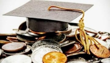 BAM Agency A graduation cap with a tassel rests on a pile of various coins, symbolizing the concept of education costs or student loans—a reflection of millennial shopping habits and their strategic spending decisions. BAM Agency